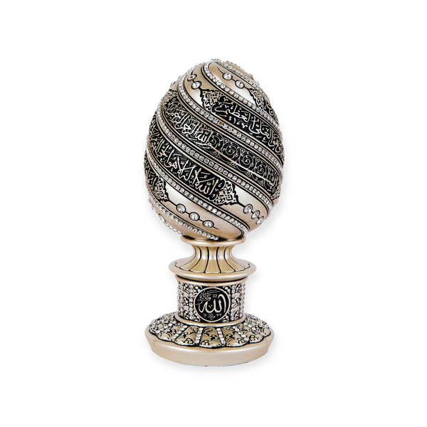 A beautiful golden and black egg sculpture engraved with Ayatul Kurs- BB-0988-2969
