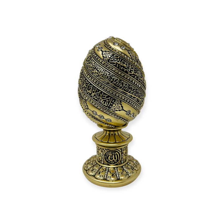 A beautiful golden and black egg sculpture engraved with Ayatul Kursi-theislamcshop.com